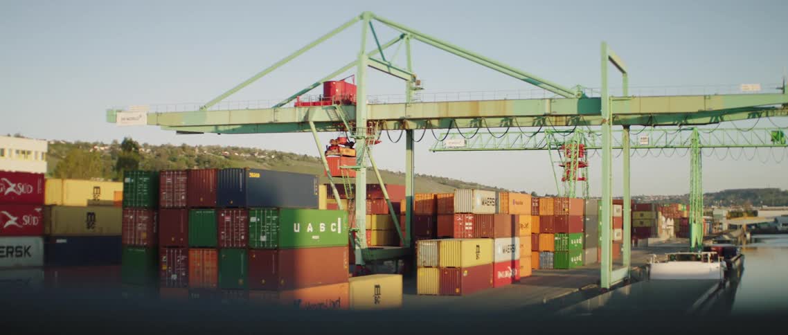 The containers sit on the large ship
