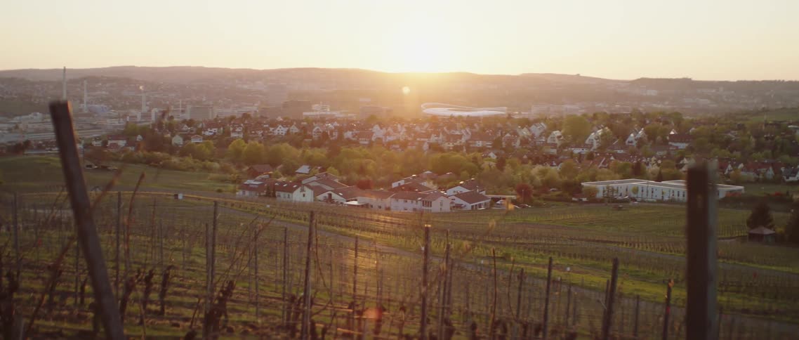 Sun rises over town in valley