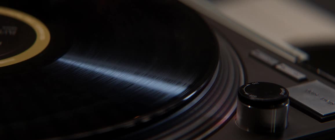 A record spins on a turntable