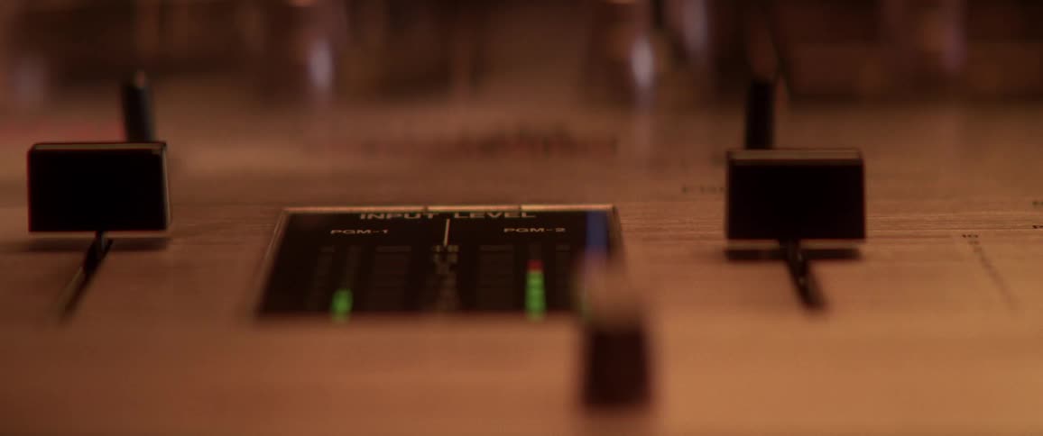 A display lights up on a soundboard