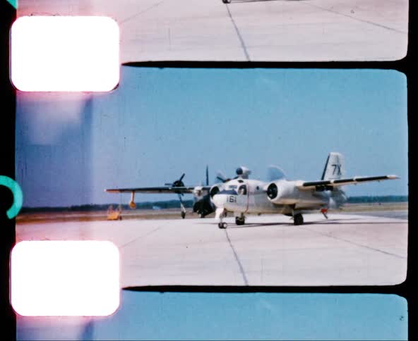 An airplane moving along an airstrip
