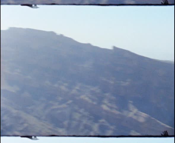 The sun hits the side of the rocks