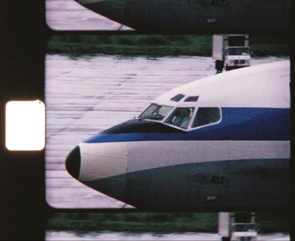 Film footage of an airplane on a runway