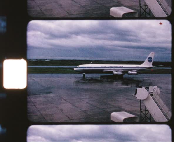 The plane moves slowly on the ground at the airport