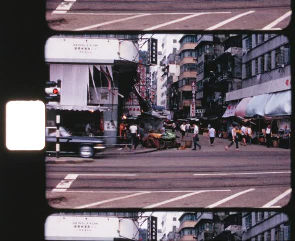 People walk down the street in downtown