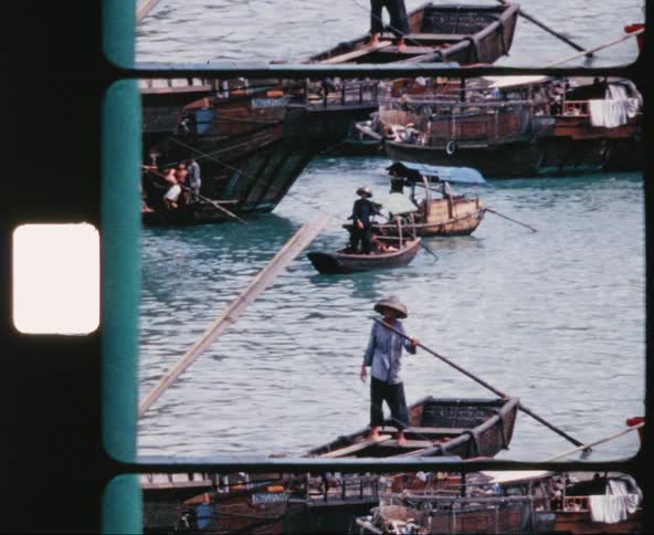 Asian people pilot various sized watercraft in the ocean
