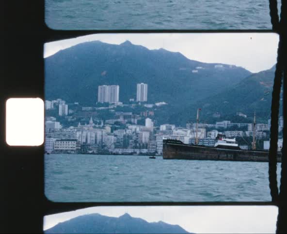 View of a coastal city from a traveling boat