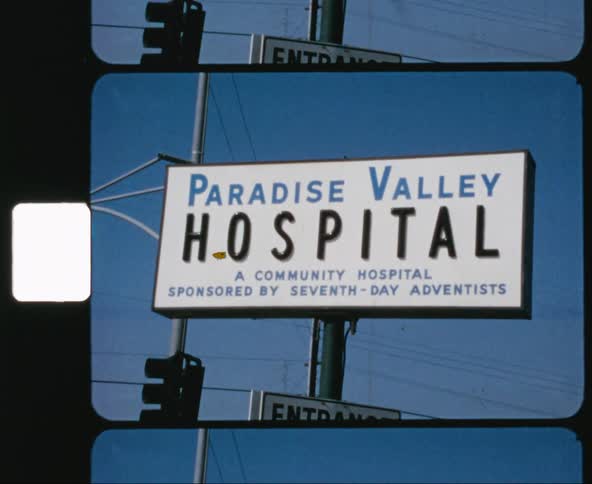Vintage footage of hospital sign in paradise valley
