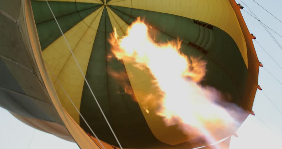Hot air balloon burner firing into the balloon