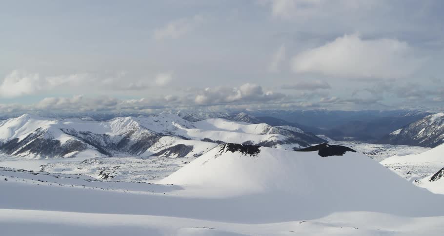 Aerial of snow covered volcanic landscape