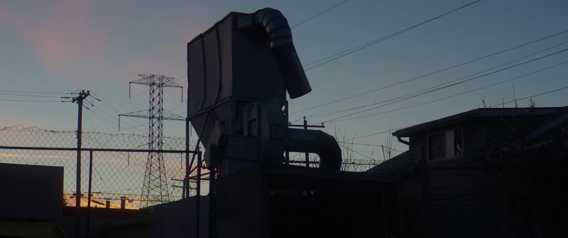 Utility towers at a factory