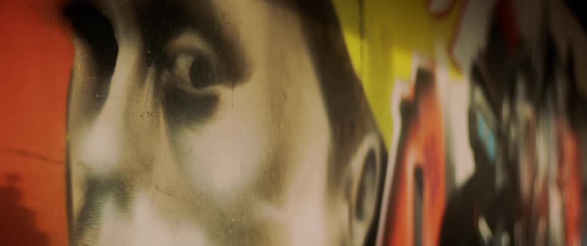 Large mural of woman against red background