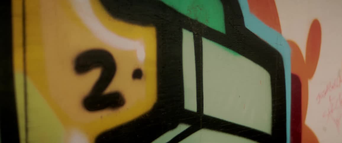 Close up of street art painted on wall