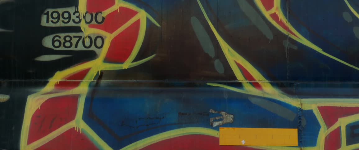 Spray painted graffiti on building