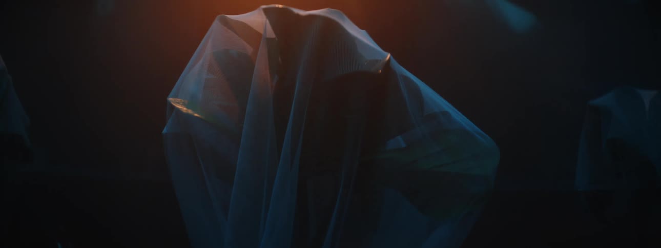 A person in a costume wrapped up in plastic