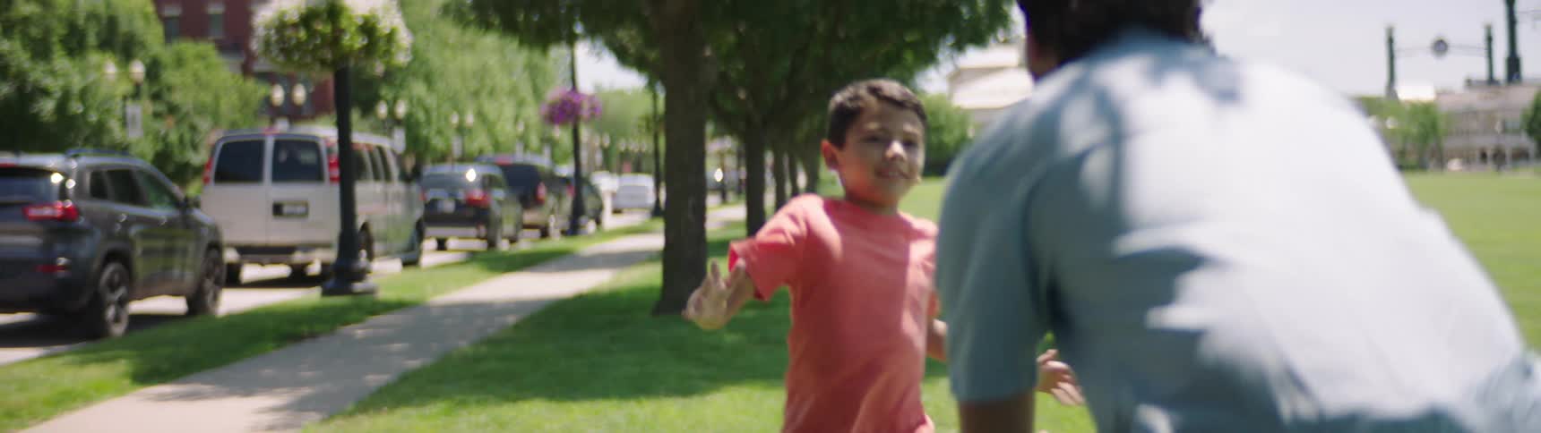 Son runs up to his father