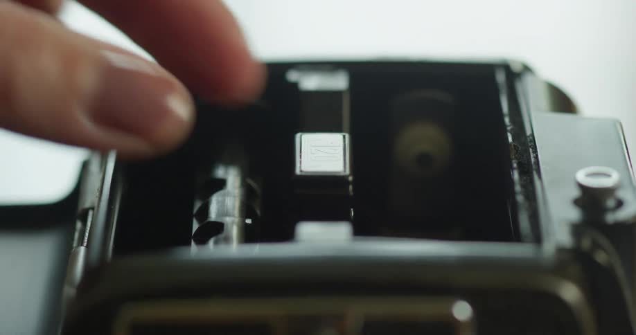 A person is grabbing footage from a camera