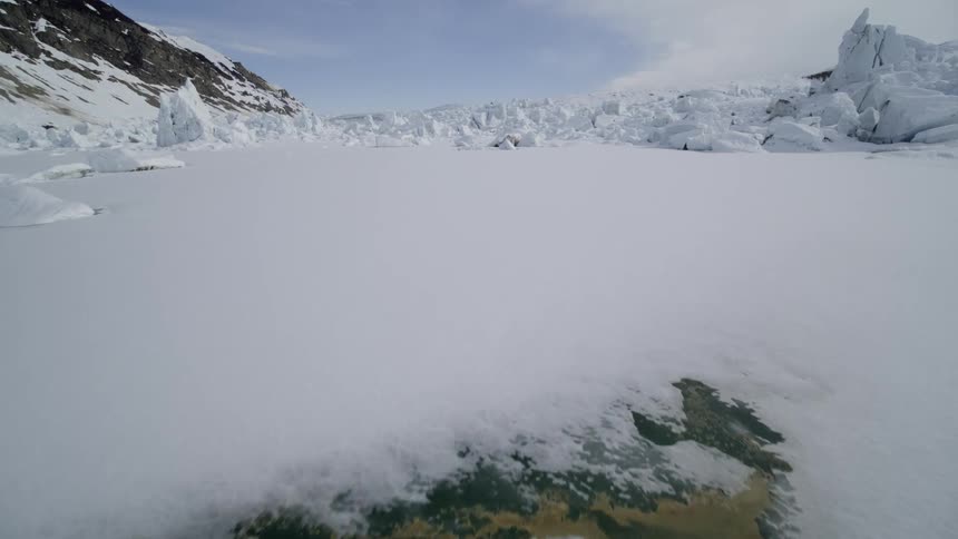 Aerial view of a snow covered landscape at day