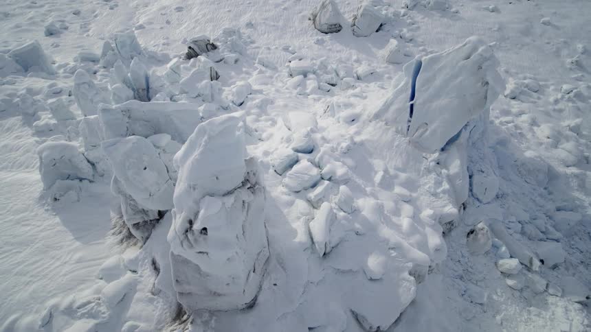 Snow and ice outcropping cover plain
