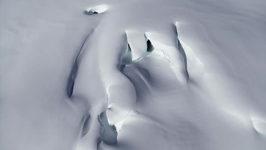 An aerial view of an arctic formation is displayed