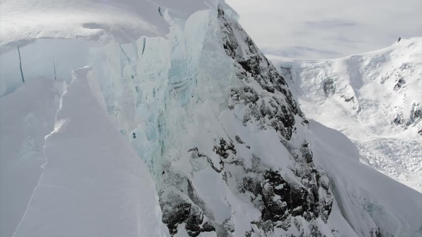 Mountain range covered in deep snow