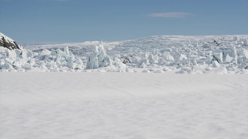 Snow with ice glaciers with the sky in the background