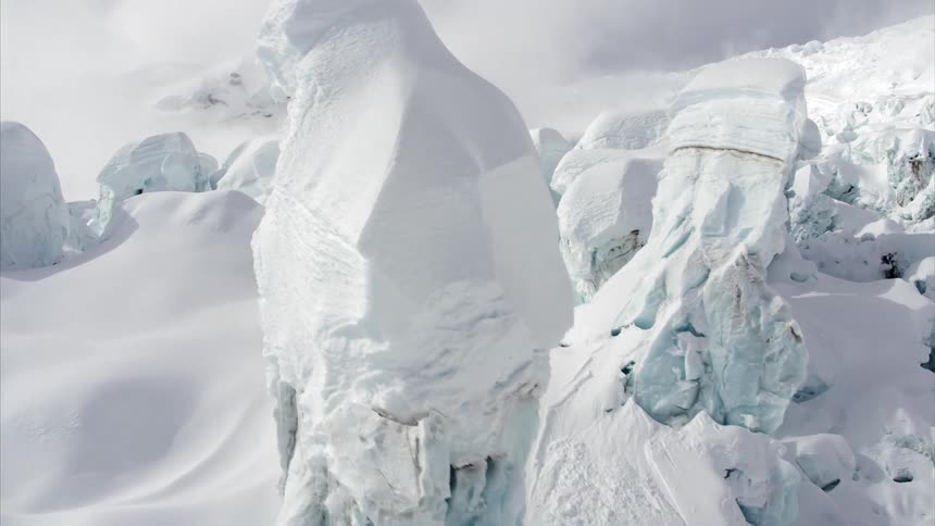 Ice caps and a snow covered mountain