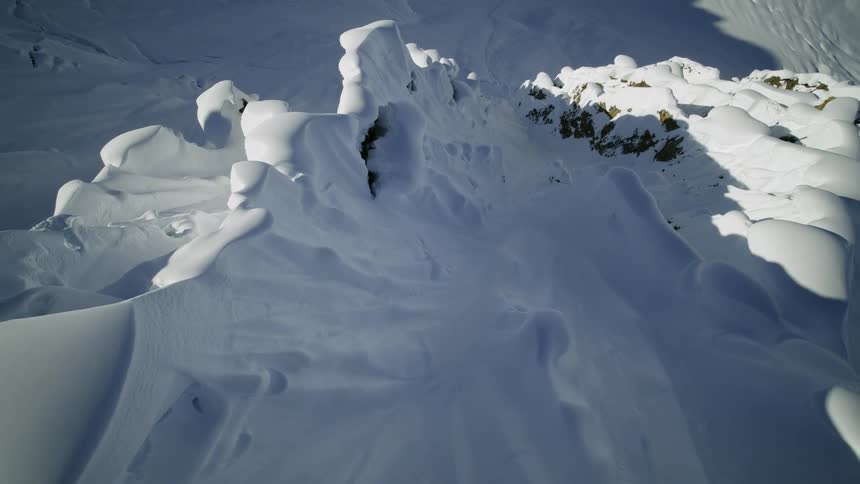 An aerial view of an arctic landform is displayed