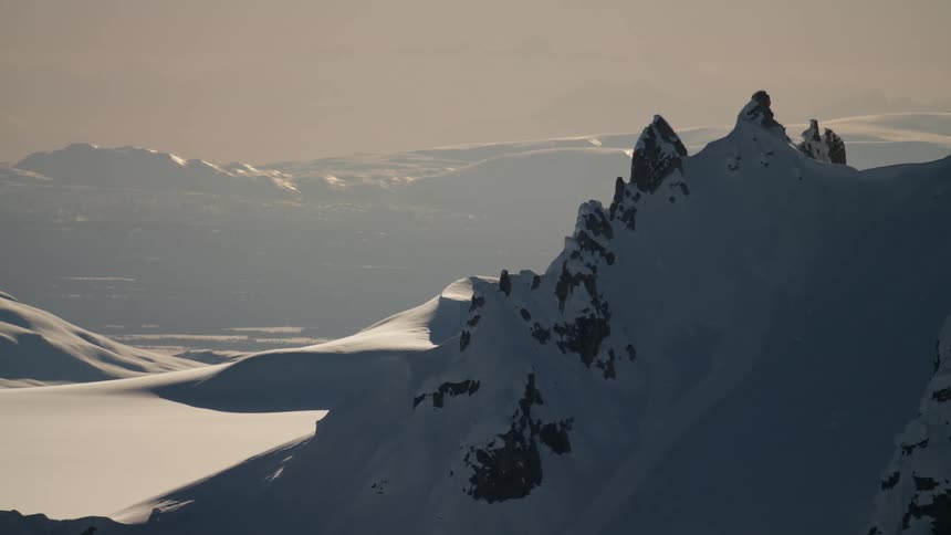 Snow covered mountains on a sunny day