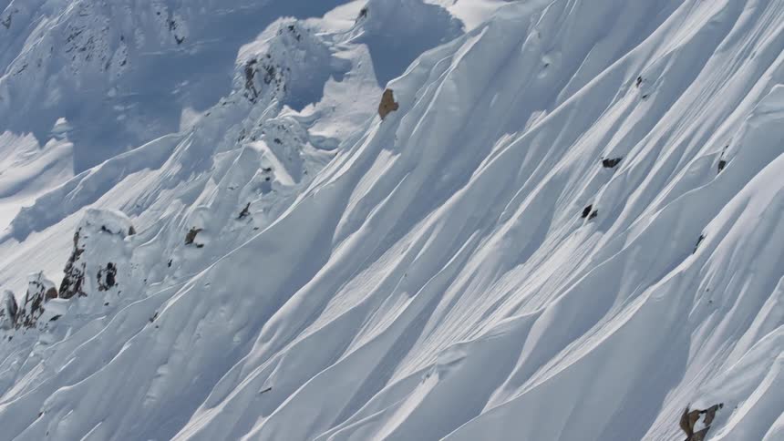 A snow covered mountain in the winter