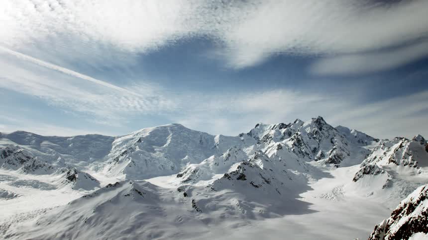 A mountain range is covered in winter snow