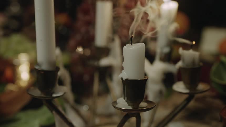 Candles burning and then being blown out