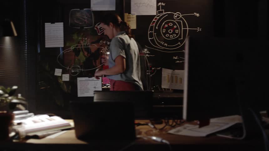 Woman pacing in her office talking to herself