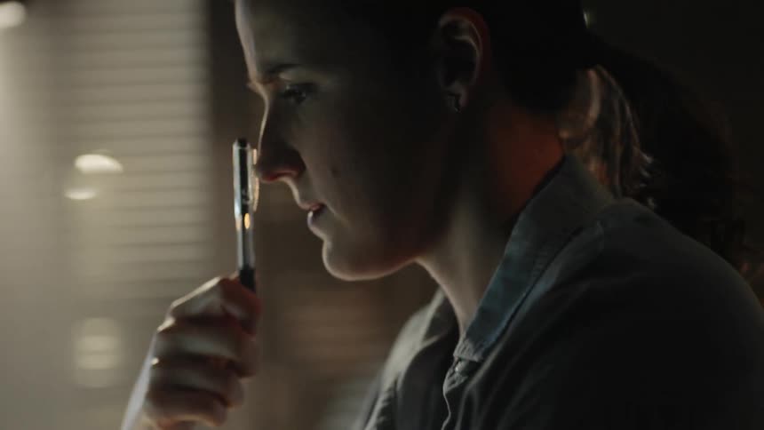 Woman working at desk and writing