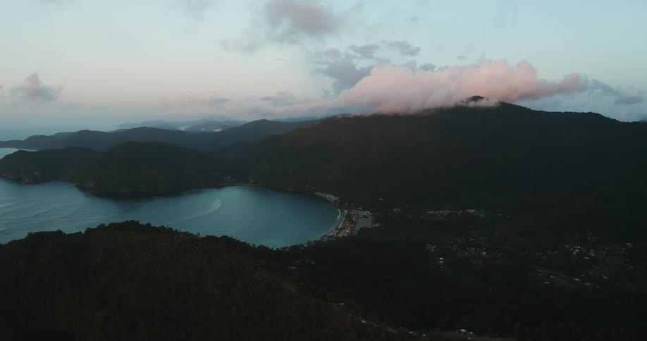 Aerial view of a tropical island during sunset