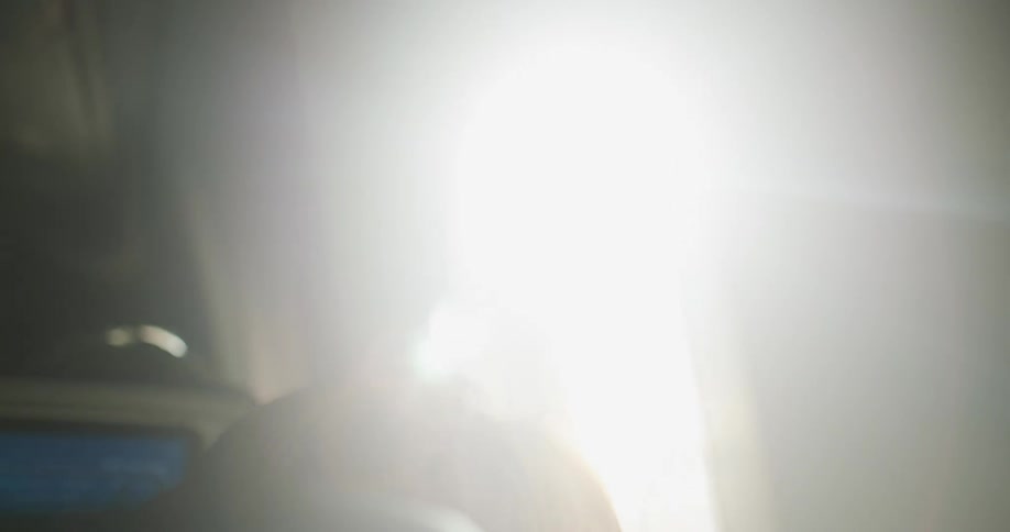 Woman looks out the plane window during the flight