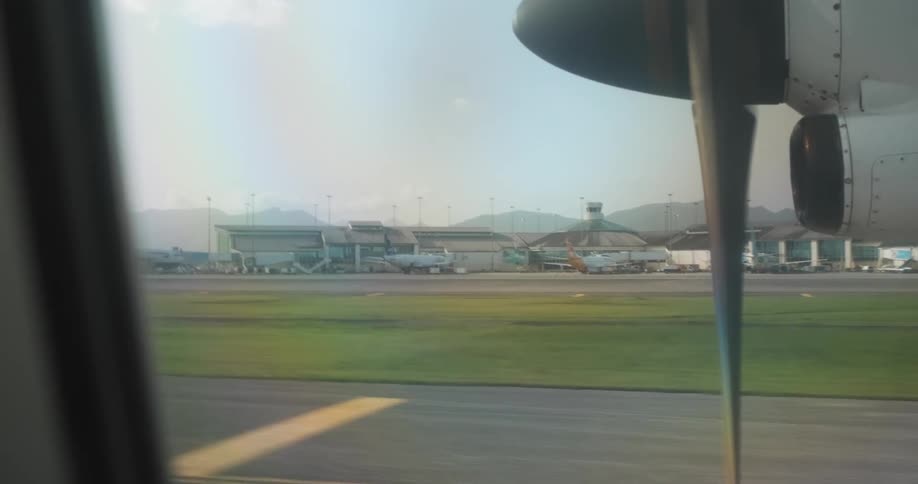Jet engine at takeoff from inside plane