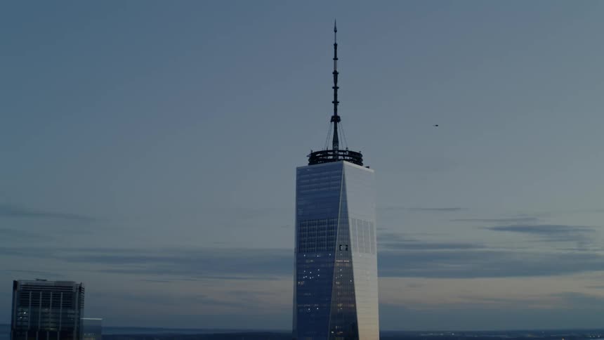 Aerial view of top of one world trade skyscraper at dawn