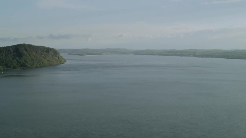 The lake is covered with light fog
