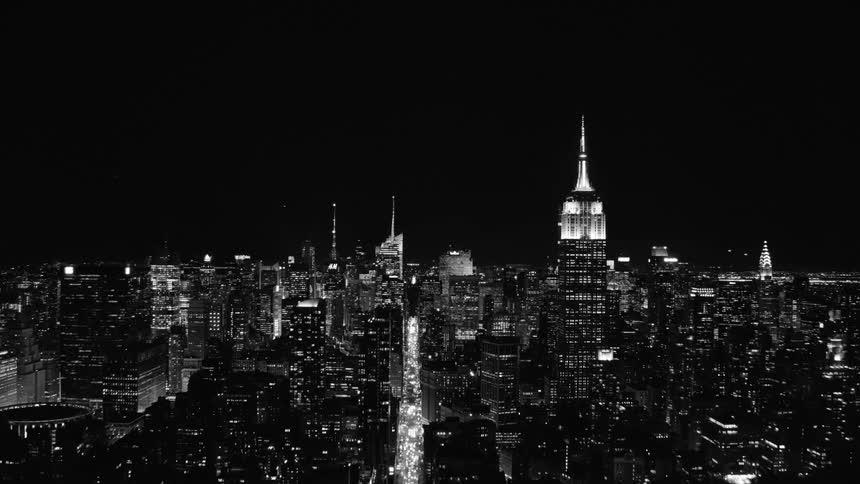 Aerial view of the illuminated tall buildings and skyscrapers
