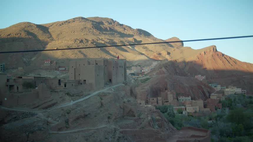 The hills are covered with stone buildings and castles