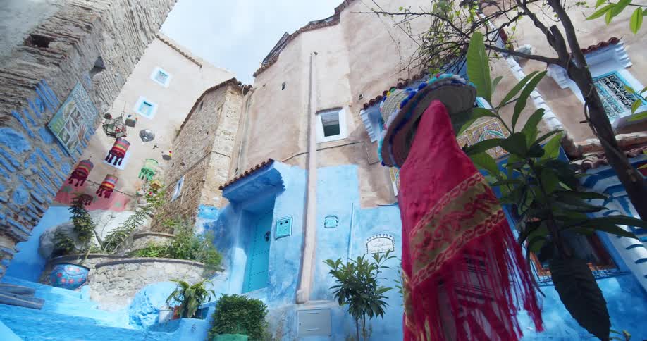 The steps and side of the building are painted a bright blue color