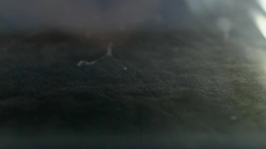 Black white and gray colors that look like glass and soil