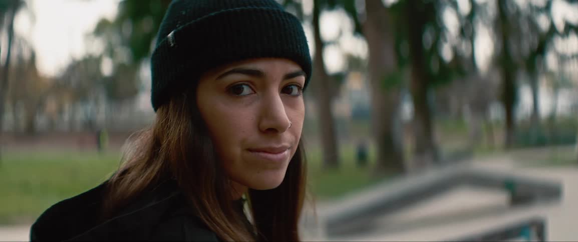 Woman stares at the camera