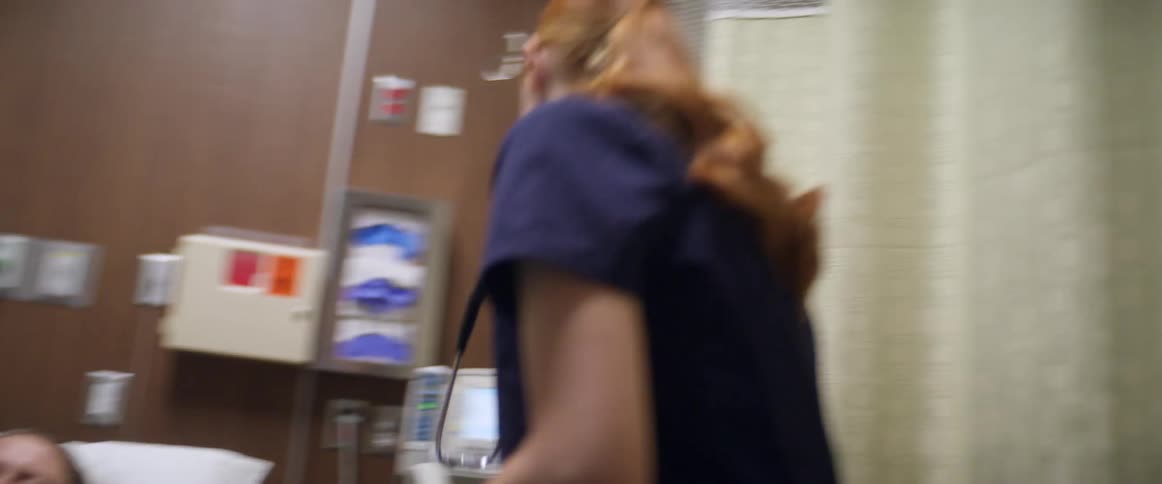 Nurses rush to treat unconscious patient in hospital bed