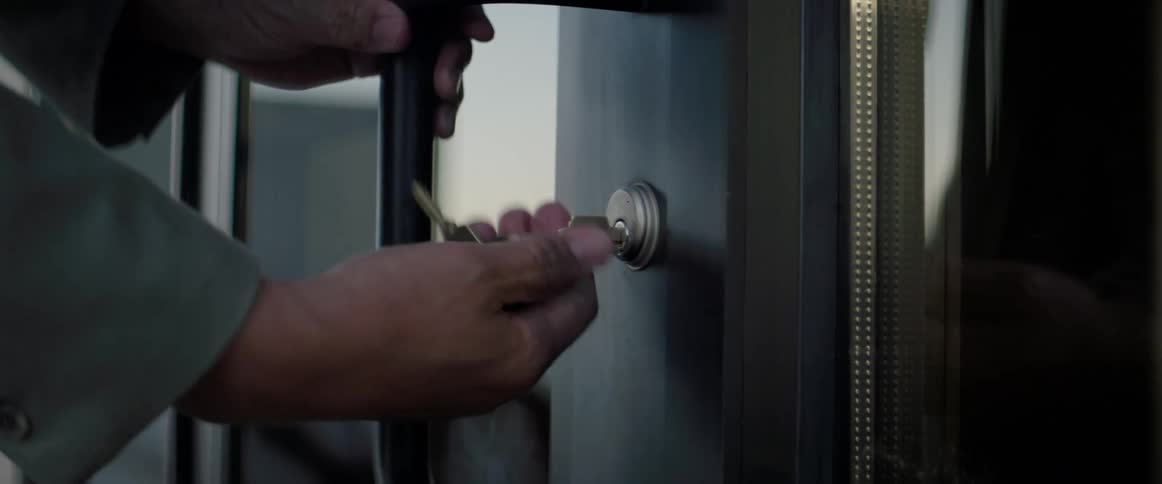 Man opens the door of the store
