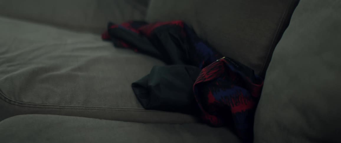 A performance where a couch pulls in a piece of clothing
