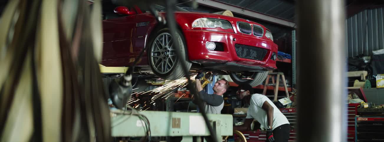 The people work on the vehicle