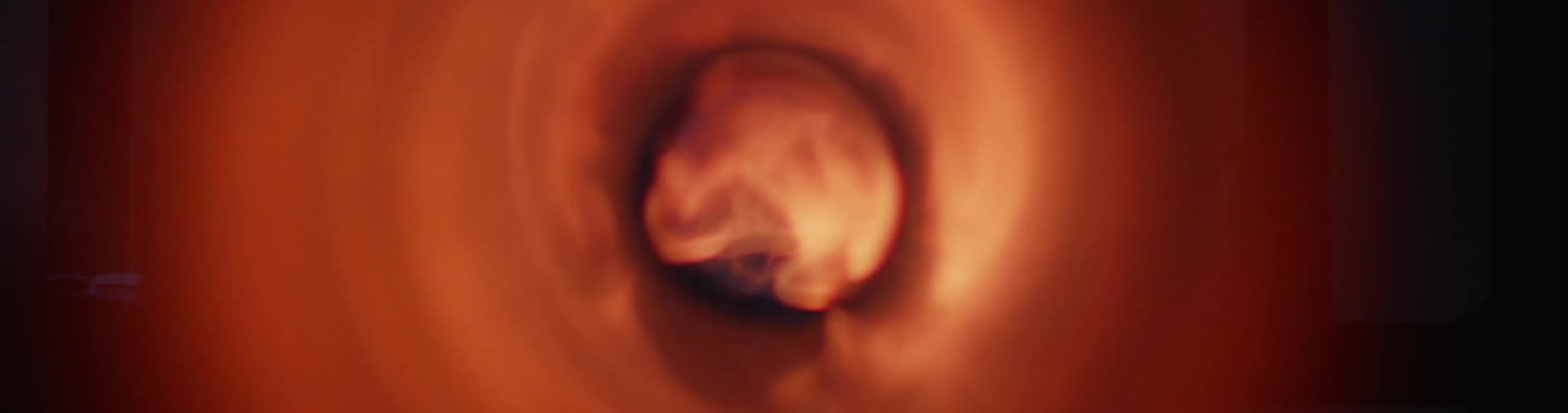 Flame being ignited on the inside of a pipe