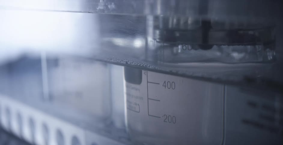 A machine pumps fluid in a lab